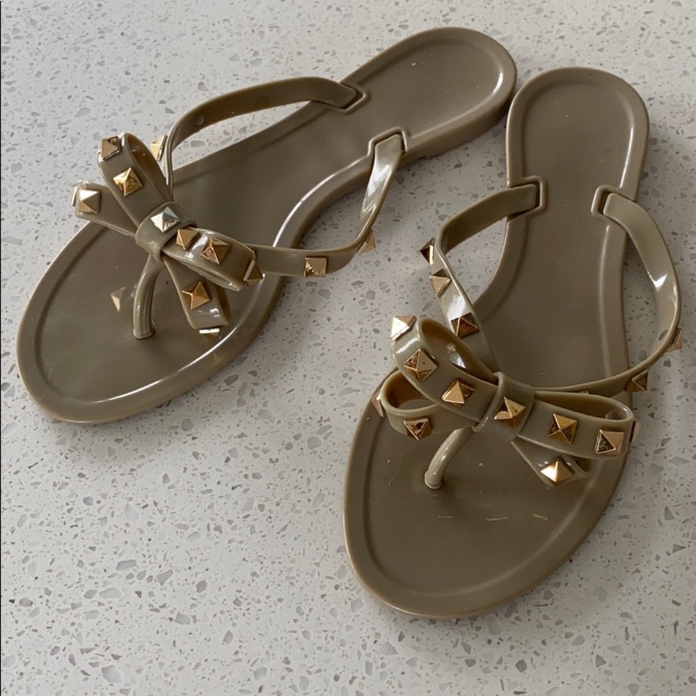 Studded jelly flip flops